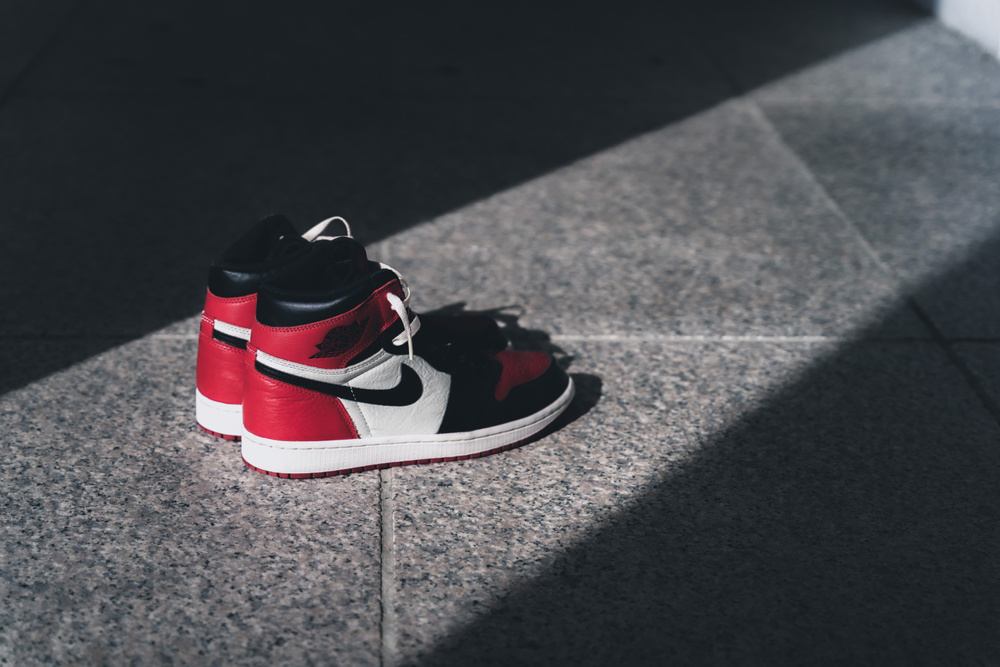Singapore, Singapore – February 09, 2022: A closeup shot of the Jordan 1 Retro Black Red sneakers. Air Jordans