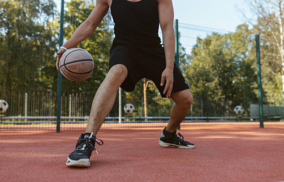 man playing basketball