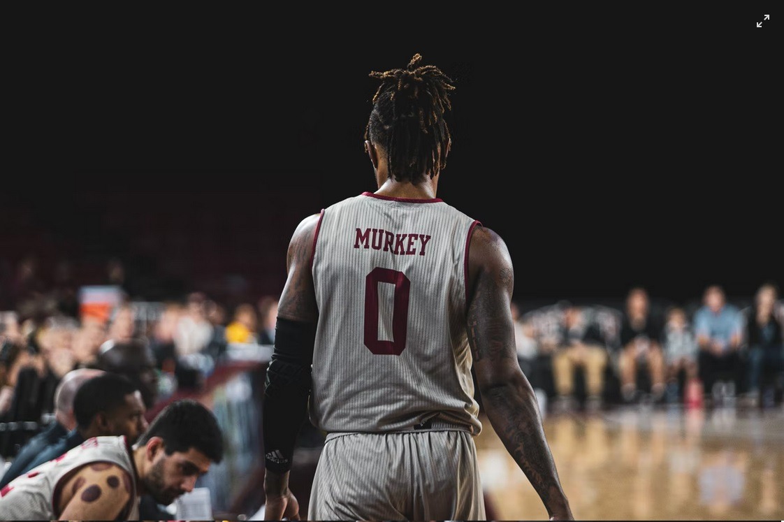 basketball player wearing compression sleeves