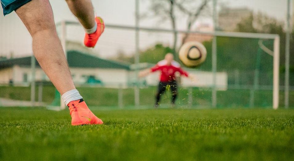 football-shot-on-goal-door-husband