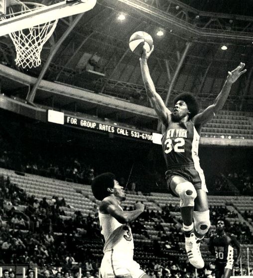 Erving dunking the ball