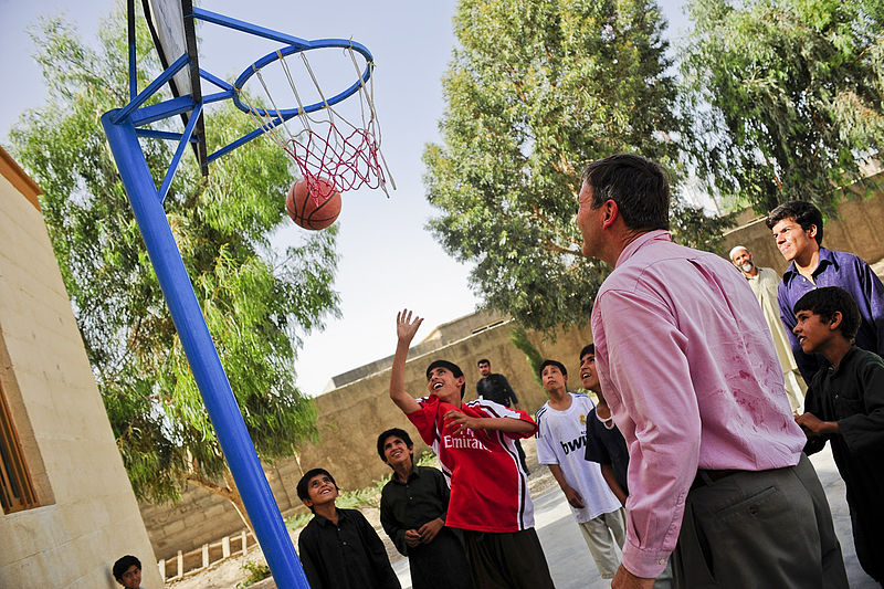 Kids playing basketball in Farah