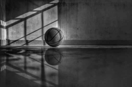 Basketball in greyscale photo