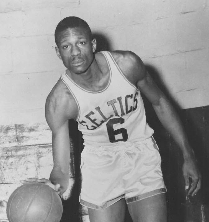 Young Bill Russell in 1957, wearing a classic Celtics jersey