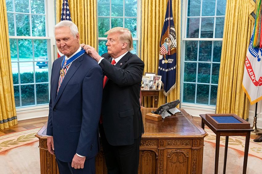 West receives the Presidential Medal of Freedom from US President Donald Trump in the Oval Office in 2019