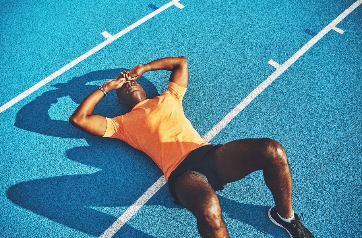 athlete lying on the ground