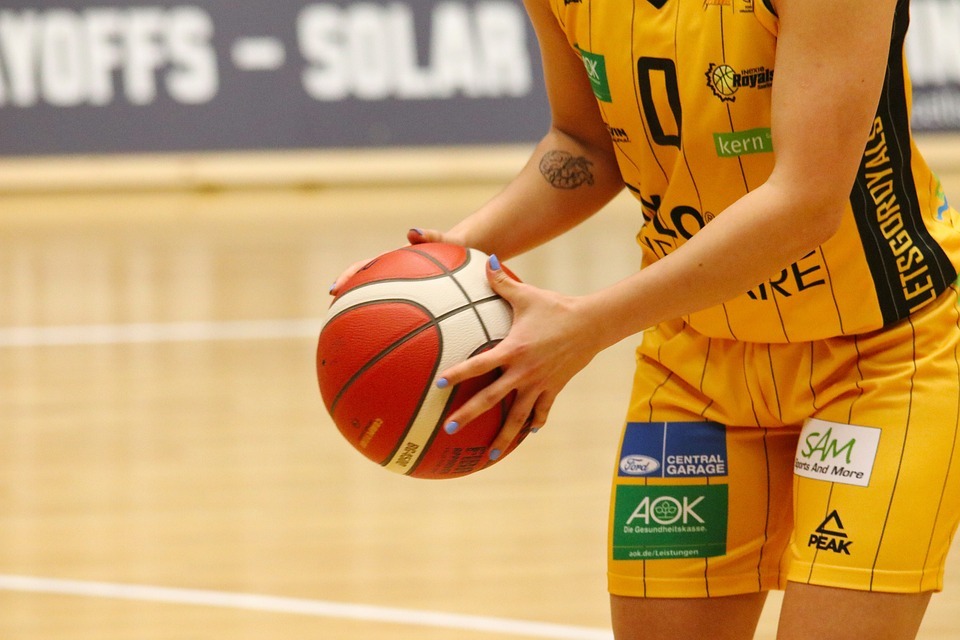 Player preparing to shoot a basketball during game